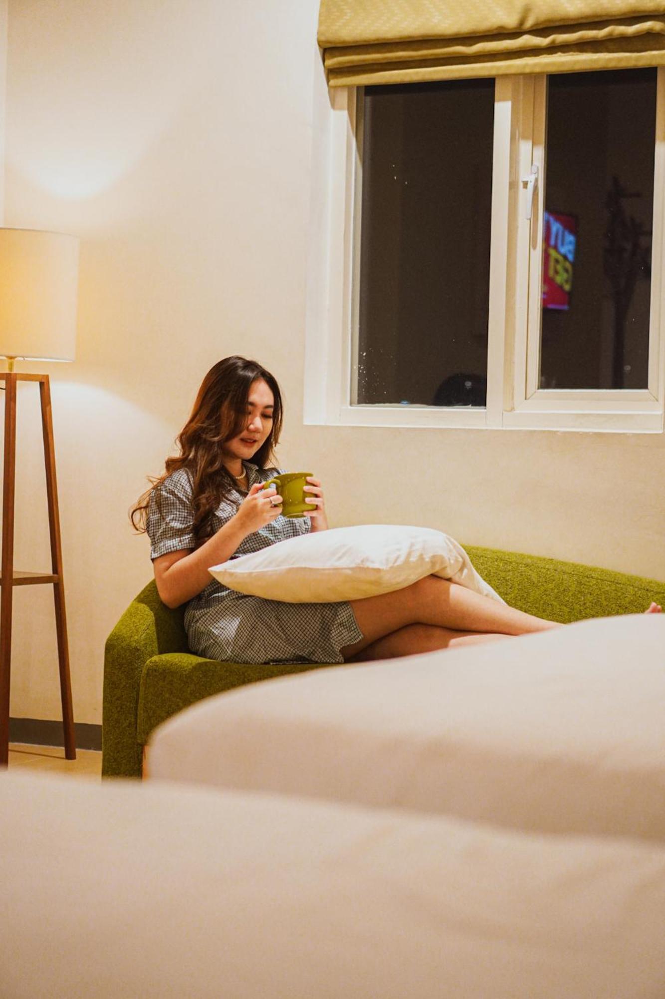Ascent Hotel & Cafe Malang होटल 3*