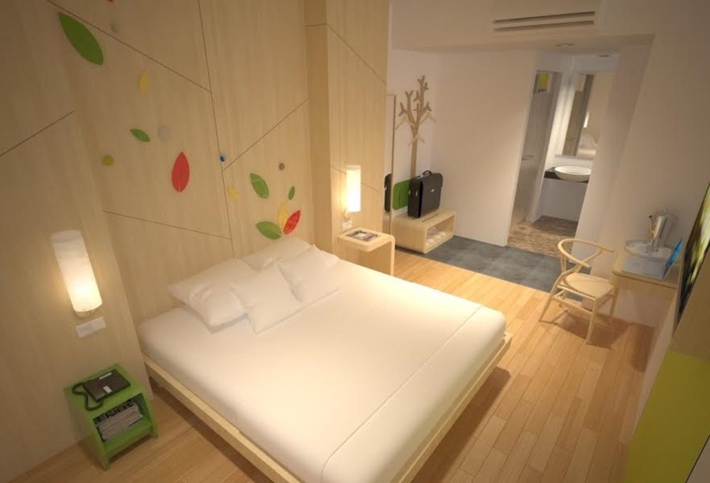 Ascent Hotel & Cafe Malang होटल 3*